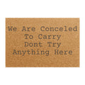 Doormat - "We Are Concealed To Carry Don't Try Anything Here" Funny Warning Welcome Mat