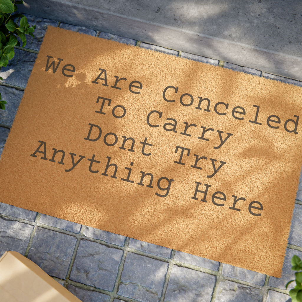 Doormat - "We Are Concealed To Carry Don't Try Anything Here" Funny Warning Welcome Mat