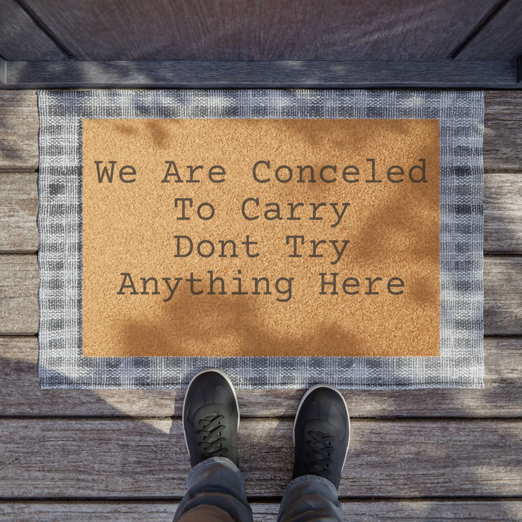 Doormat - "We Are Concealed To Carry Don't Try Anything Here" Funny Warning Welcome Mat
