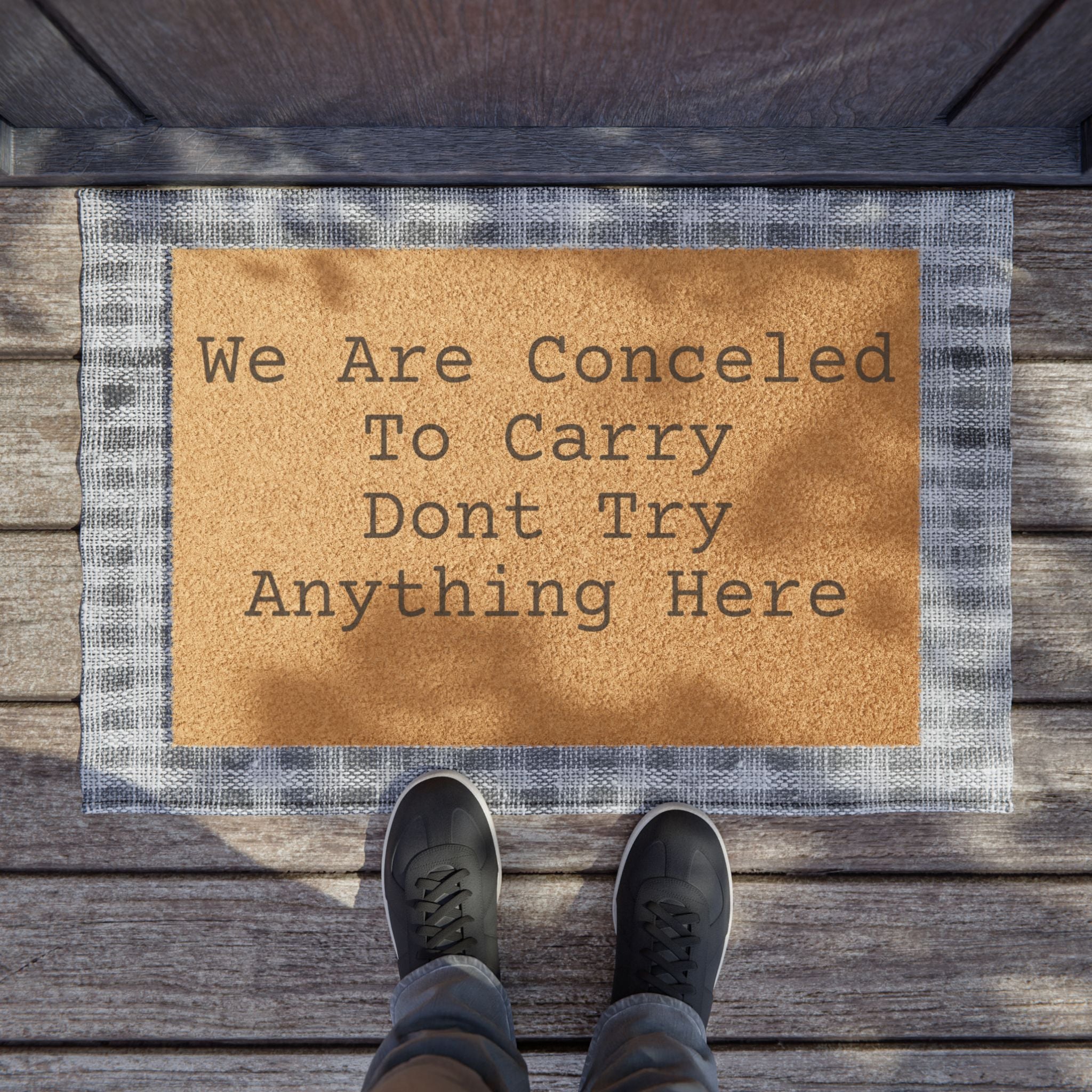 Doormat - "We Are Concealed To Carry Don't Try Anything Here" Funny Warning Welcome Mat